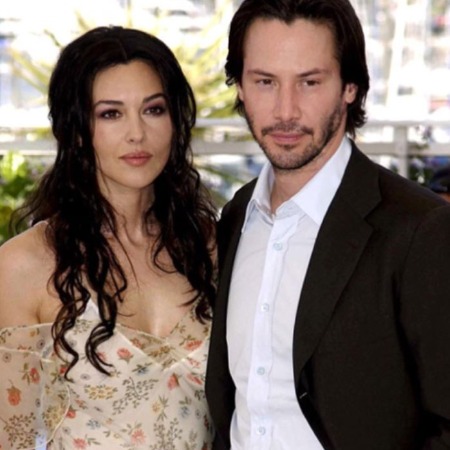 Monica Bellucci with Keanu Reeves at some film festival. 
